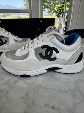 CHANEL White, Silver & Black Leather Logo Sneakers with Blue Lining